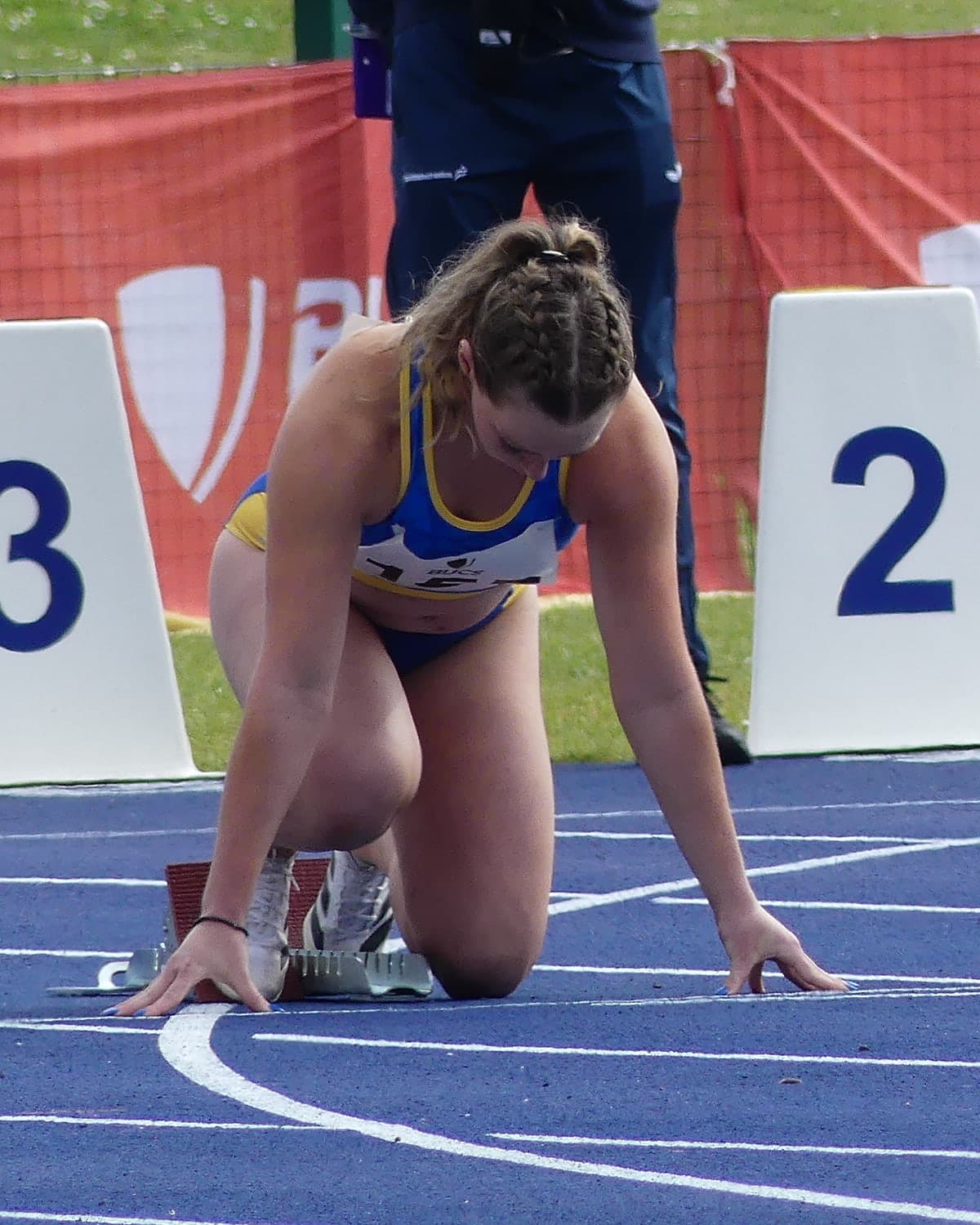Millie set in the blocks at the start of a race